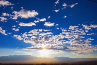 Image of skyline with hills in background and clouds