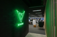 Versent illuminated sign in office space