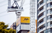 Mirvac logos on corporate building and crane